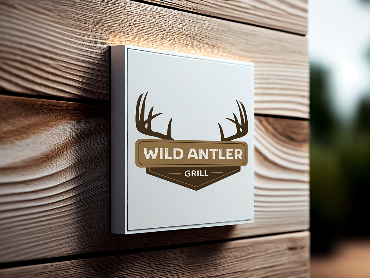 ild Antler Grill brand identity featuring a rustic logo with deer antlers displayed on a restaurant exterior.